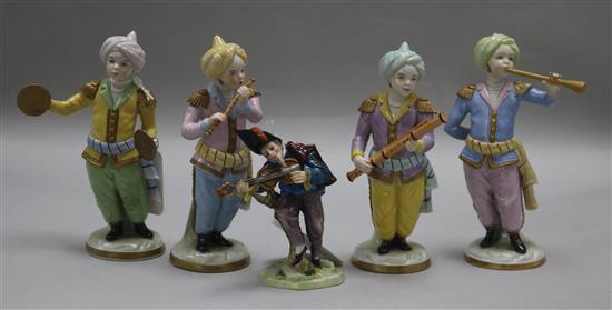 A Sitzendorf porcelain Turkish four-piece band and a 19th century Continental Commedia dellArte figure